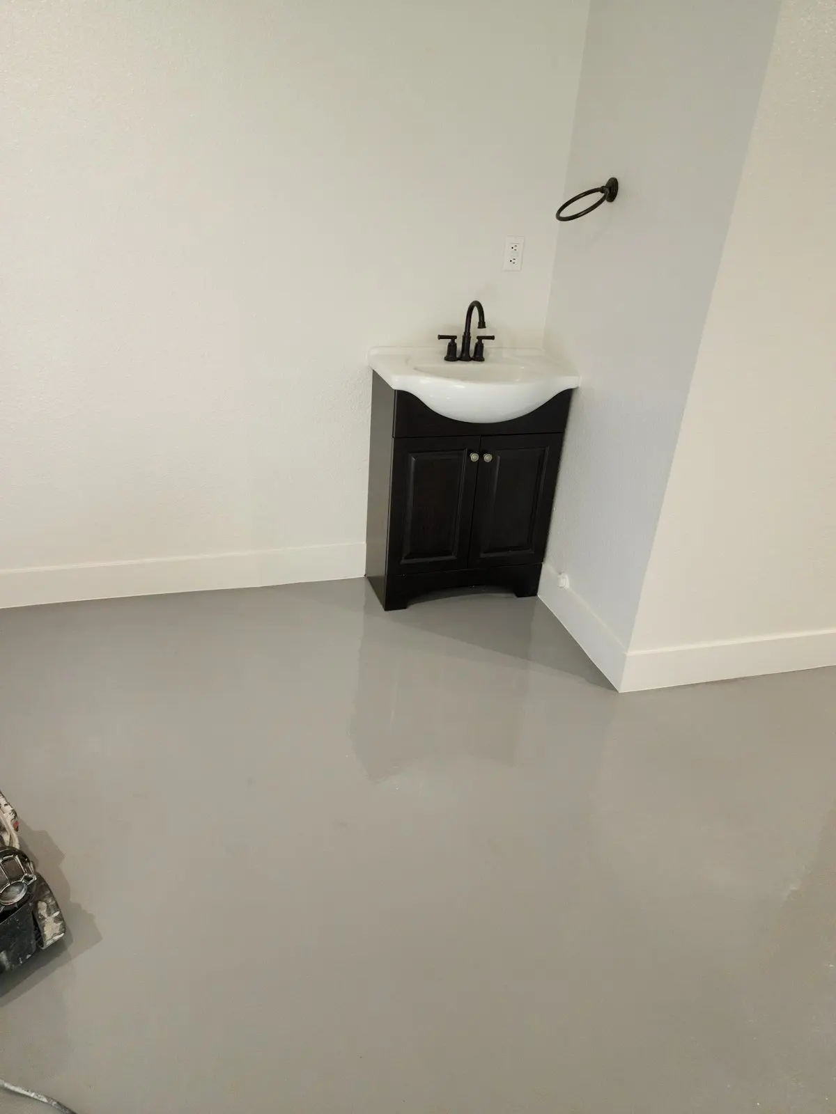 Finished bathroom corner with vanity